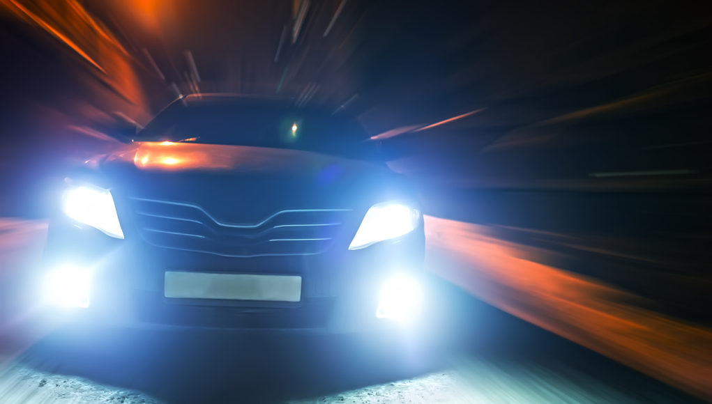 cars in the winter night city