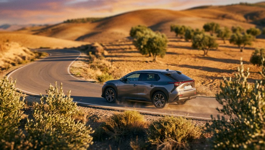 dynamic-suv-drive-through-golden-hour-arid-landscape