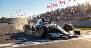 GP Canada 2026 : Antonelli s’impose et domine la saison Une monoplace de Formule 1 franchit la ligne d'arrivée sous une pluie de confettis, le pilote lève le bras en signe de victoire.