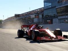 Le triomphe de Lewis Hamilton avec Ferrari à Barcelone Une Formule 1 rouge Ferrari franchit la ligne d'arrivée sous un drapeau à damier sur le circuit de Barcelone.
