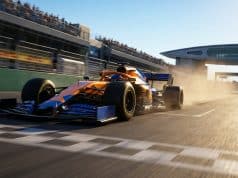 Victoire de Lando Norris en Hongrie 2026 : le succès McLaren Une monoplace McLaren orange et bleue franchit la ligne d'arrivée sur le circuit de Hongrie sous un soleil éclatant.