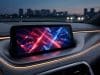 Publicité spider man bmw : l’habitacle devient un média Écran central d'une BMW affichant des motifs géométriques rouge et bleu avec la silhouette de Spider-Man en arrière-plan.